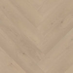 Julia greige eiken walvisgraat Visgraat XL PVC vloer van Stile Floors – realistische houtlook voor woonkamer en slaapkamer.