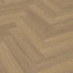 Vivian naturel eiken walvisgraat Visgraat XL PVC vloer van Stile Floors – warme houtlook voor huiselijke ruimtes.